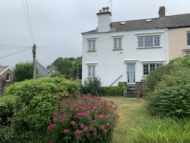 view of corner cottage from the garden